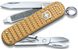 Мультитул нож Victorinox Classic SD Precious Alox Brass Gold 0.6221.408G 4008492 фото 1